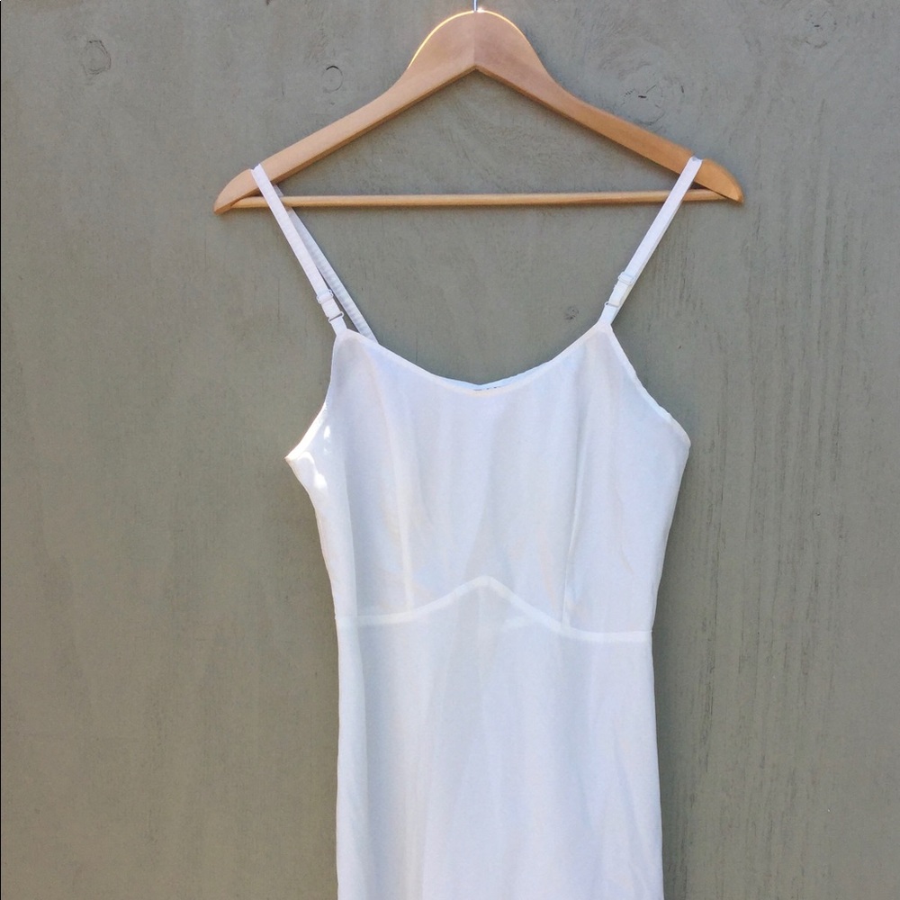 Vintage - The Snip-it, thin strapped, beige slip.